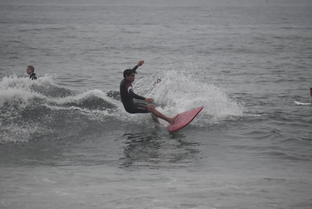 Surfer performing maneuver